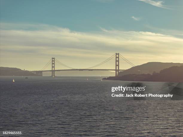 bayside serenity: golden gate bridge in the afternoon light - san francisco harbor stock pictures, royalty-free photos & images