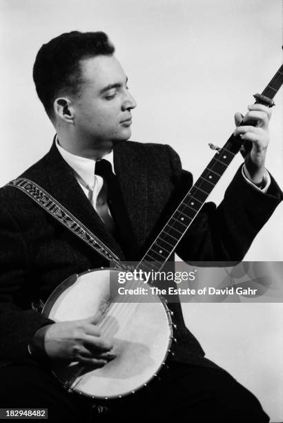 Folk singer and original member of the progressive folk music group The Tarriers, Erik Darling poses for a portrait in October 1959 in Greenwich...