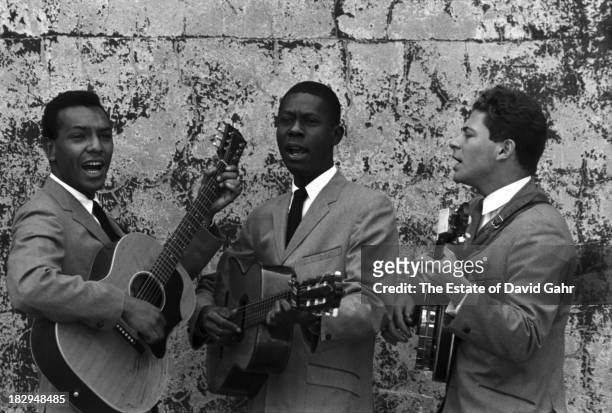 Progressive folk music group The Tarriers pose for a publicity portrait in August, 1960 in Greenwich Village, New York City, New York. The Tarriers...