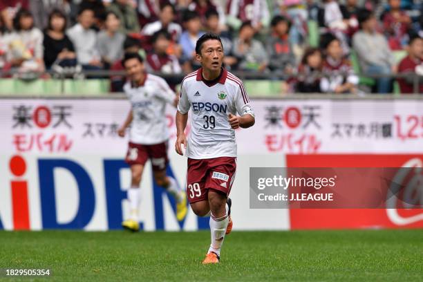 Yoshiro Abe of Matsumoto Yamaga celebrates after scoring the team's first goal during the J.League J1 second stage match between Vissel Kobe and...