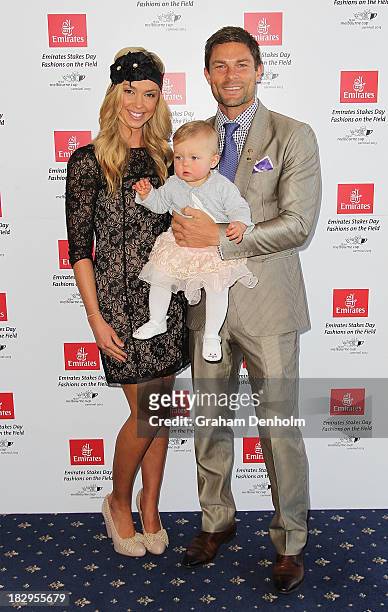 Television presenter Brodie Harper and her husband Heath Meldrum pose with their daughter Jessica at the Emirates Stakes Day Fashion on the Field...