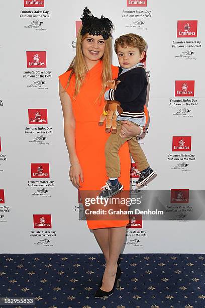 Stylist and blogger Jess Dempsey poses with her son at the Emirates Stakes Day Fashion on the Field Launch at Flemington Racecourse on October 3,...