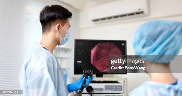 colonoscopy endoscopic examination - menselijke darmen stockfoto's en -beelden