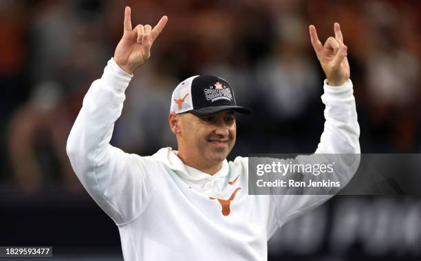 Head coach Steve Sarkisian of the Texas Longhorns celebrates after Texas defeated the Oklahoma State Cowboys in the Big 12 Championship at AT&T...