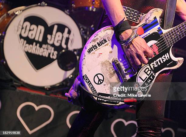 Musician Joan Jett of Joan Jett & The Blackhearts performs at Santos Party House on October 2, 2013 in New York City.