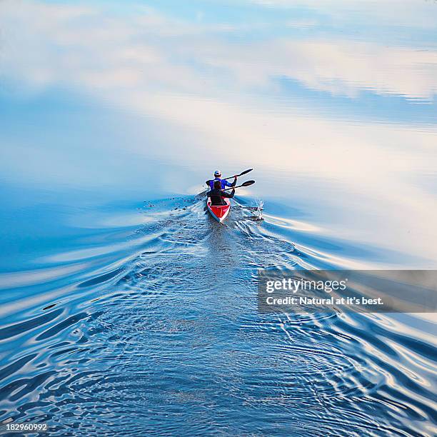 cutting sky - boat river stockfoto's en -beelden