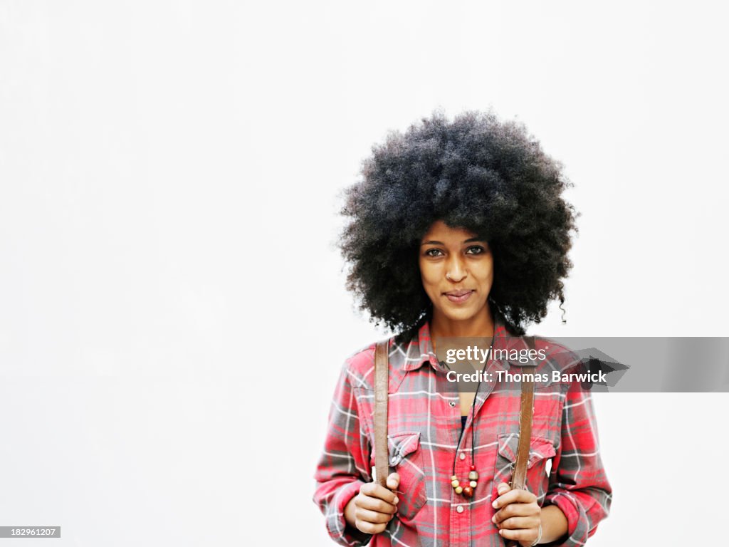 Smiling woman with afro hairstyle