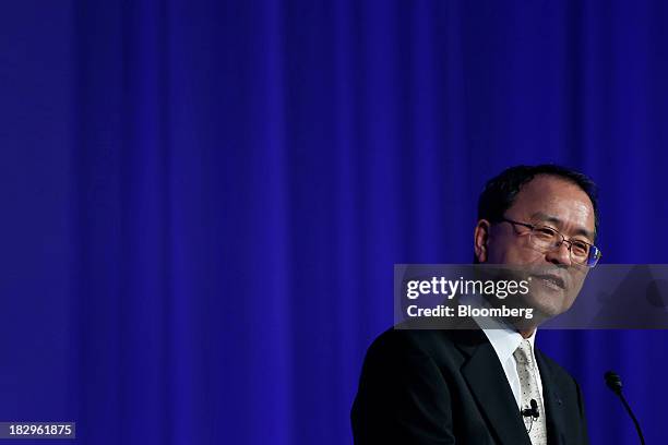 Takashi Tanaka, president of KDDI Corp., speaks during a product launch event for the company's "au" brand of smartphones in Tokyo, Japan, on...