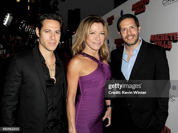 Paris Latsis, Marianna Latsis, and Terry Dougas arrive at the premiere of Open Road Films' "Machete Kills" at Regal Cinemas L.A. Live on October 2,...