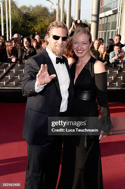 Henning Baum and Corinna Baum attend the Deutscher Fernsehpreis 2013 at the Coloneum on October 2, 2013 in Cologne, Germany.