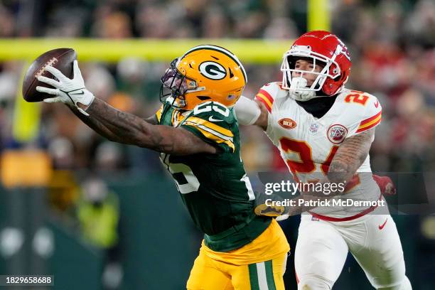 Keisean Nixon of the Green Bay Packers intercepts a pass intended for Skyy Moore of the Kansas City Chiefs during the fourth quarter at Lambeau Field...