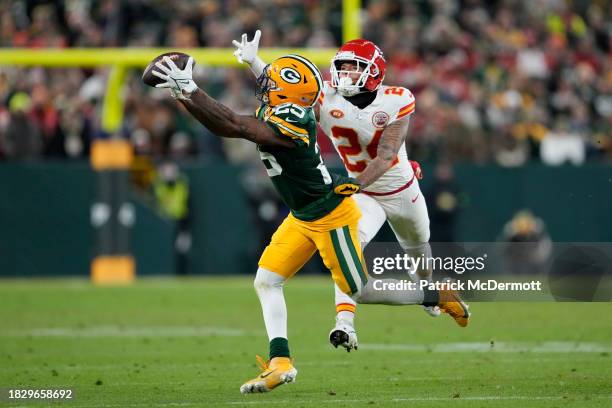 Keisean Nixon of the Green Bay Packers intercepts a pass intended for Skyy Moore of the Kansas City Chiefs during the fourth quarter at Lambeau Field...