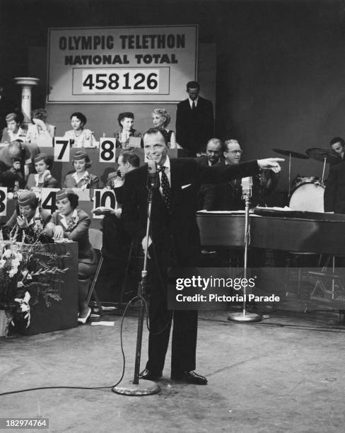 American actor and singer Frank Sinatra performing on the NBC-CBS TV 'Olympic Telethon' at the El Capitan Theatre in Los Angeles, 21st-22nd June...