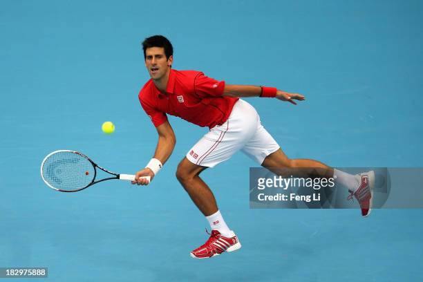 Novak Djokovic of Serbia returns a shot during his men's singles match against Fernando Verdasco of Spain on day six of the 2013 China Open at the...