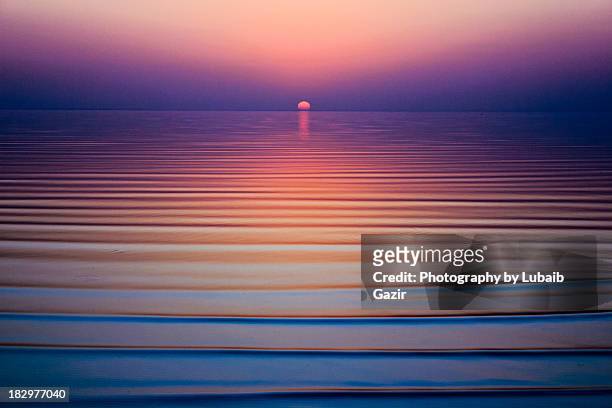 sunset - long exposure water stock pictures, royalty-free photos & images