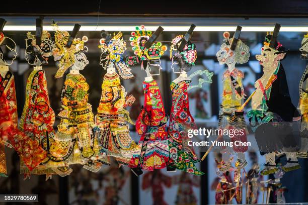 chinese shadow puppet at jinli street - puppet theatre stock pictures, royalty-free photos & images