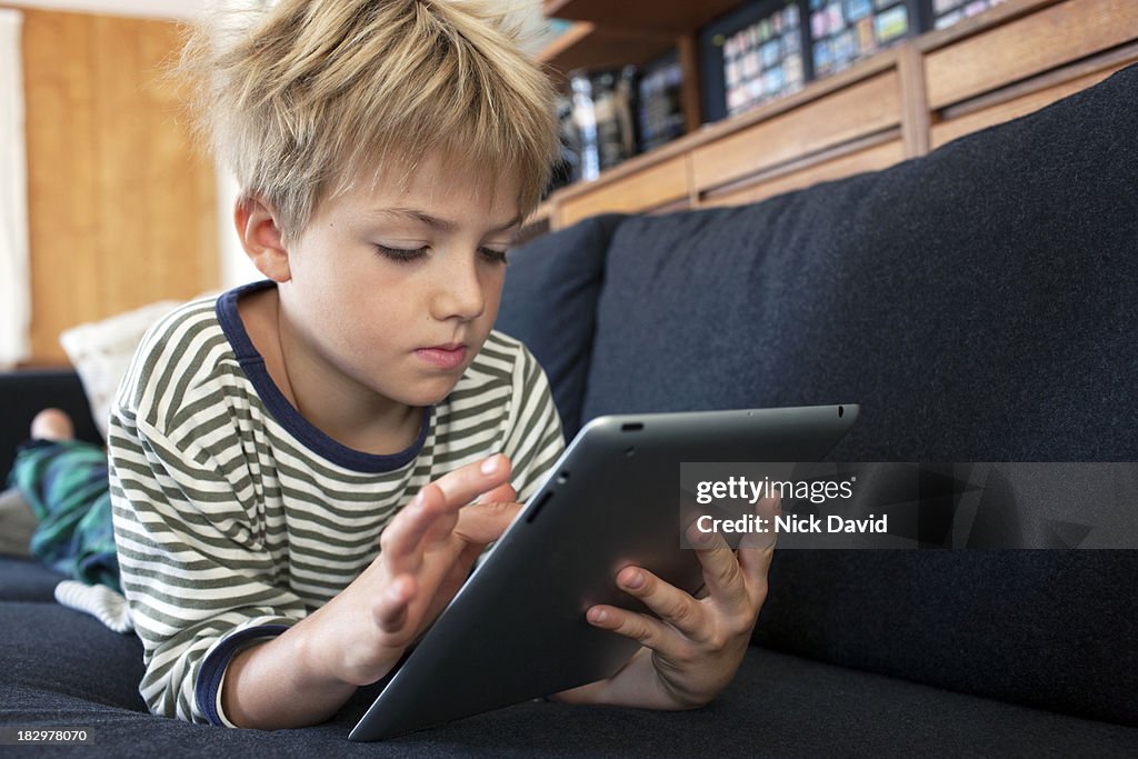 Child playing on tablet