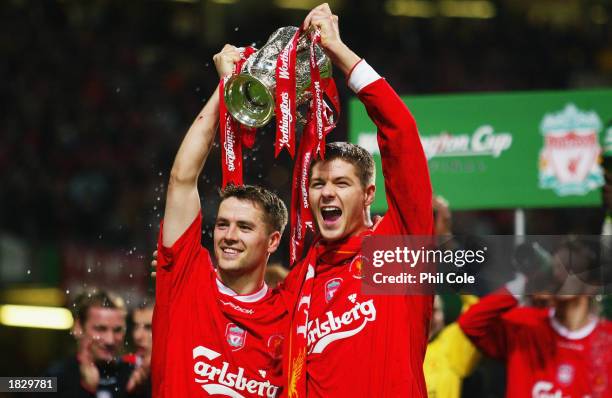 Goalscorers Michael Owen and Steven Gerrard of Liverpool celebrate with the trophy during the Worthington Cup Final between Liverpool and Manchester...