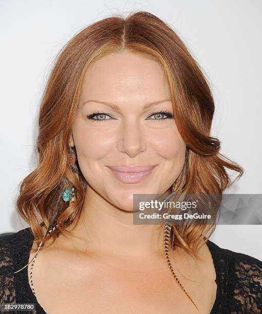 Actress Laura Prepon arrives at the Los Angeles premiere of "Machete Kills" at Regal Cinemas L.A. Live on October 2, 2013 in Los Angeles, California.