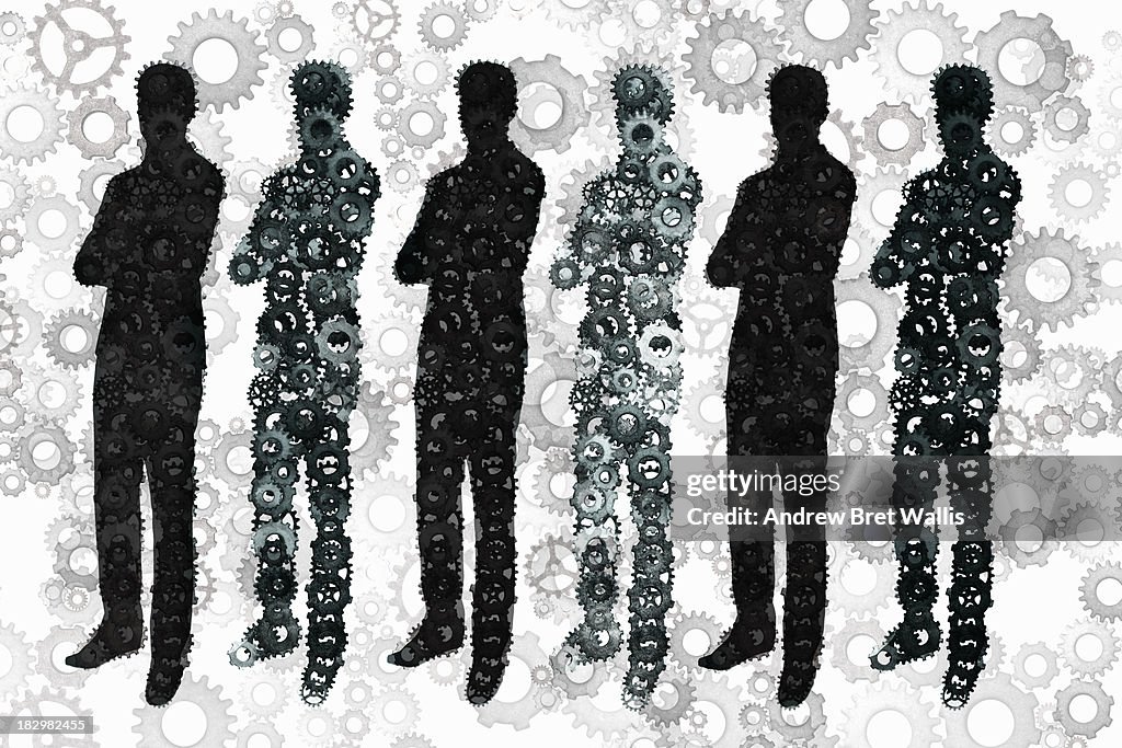 Row of businessmen made from interlocking cogs