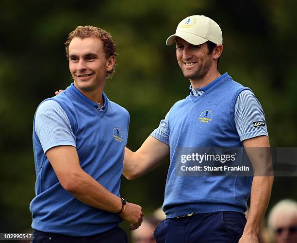 Joost Luiten and Gregory Bourdy of the European team celebrate during the first day's fourballs at the Seve Trophy at Golf de Saint-Nom-la-Breteche...