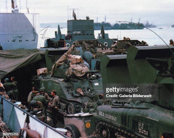 Sherman tanks and troops have been loaded into a Landing Craft Tank in Southern England. 5th June 1944. This ship will participate in the invasion of...
