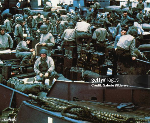 Equipment and troops have been loaded into a Landing Craft Tank in Southern England. 5th June 1944. This ship will participate in the invasion of...