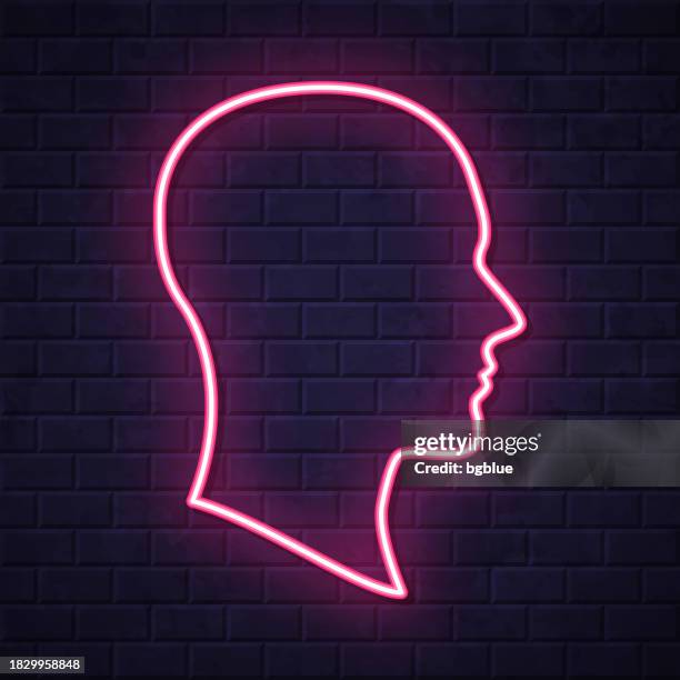 head profile. glowing neon icon on brick wall background - portrait light source stock illustrations