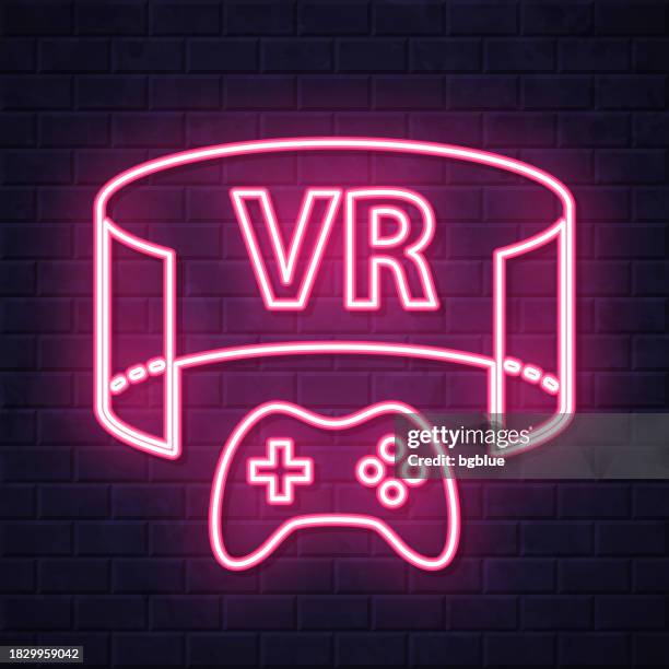 vr game - virtual reality game. glowing neon icon on brick wall background - augmented reality screen stock illustrations