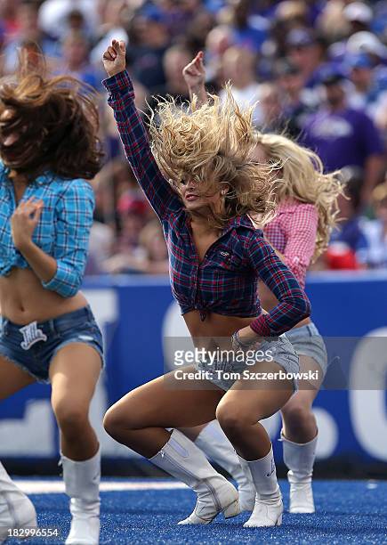 Member of the Buffalo Bills cheerleaders the Buffalo Jills performs during NFL game action against the Baltimore Ravens at Ralph Wilson Stadium on...