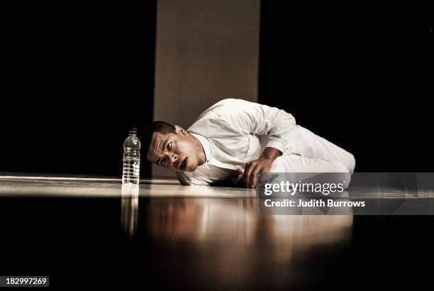 Dancer Jean Abreu performs the piece 'Blood' at the Linford studios, ROH, London, 27th June 2013.