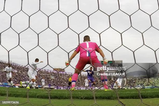 Douglas of Sanfrecce Hiroshima scores the team's fifth and hat trick goal during the J.League J1 second stage match between Sanfrecce Hiroshima and...