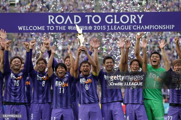 Captain Toshihiro Aoyama of Sanfrecce Hiroshima lifts the J.League J1 Second Stage Winners trophy at the ceremony following the J.League J1 second...
