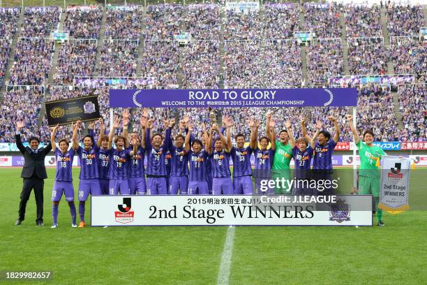 Captain Toshihiro Aoyama of Sanfrecce Hiroshima lifts the J.League J1 Second Stage Winners trophy at the ceremony following the J.League J1 second...