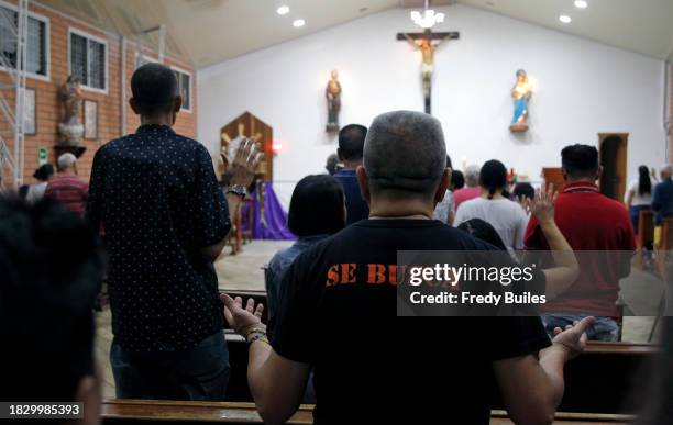 Man whit a t-shirt that says "Wanted" attends the 30th anniversary mass of the late Colombian drug trafficker Pablo Escobar on December 02, 2023 in...