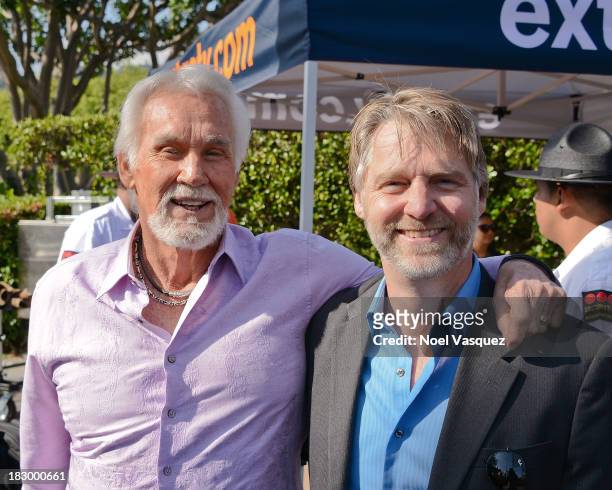 Kenny Rogers and his son Kenny Rogers Jr visit "Extra" at Universal Studios Hollywood on October 3, 2013 in Universal City, California.