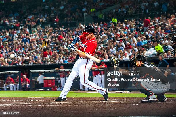 Elliot Johnson of the Atlanta Braves bats against the Miami Marlins at Turner Field on August 30, 2013. The Braves won 2-1.