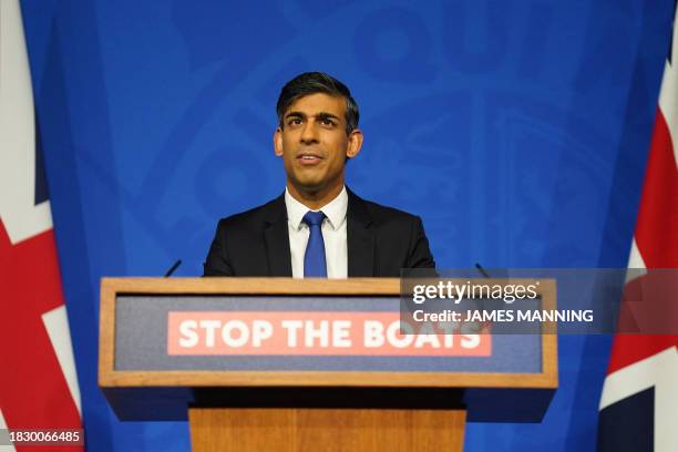 Britain's Prime Minister Rishi Sunak hosts a press conference inside the Downing Street Briefing Room, in central London, on December 7 after Britain...