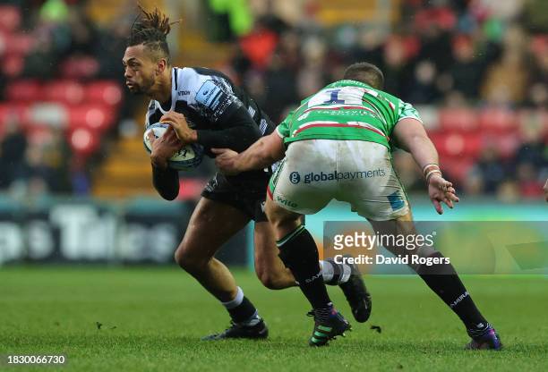 Elliot Obatoyinbo of Newcastle Falcons is tackled by Francois van Wyk during the Gallagher Premiership Rugby match between Leicester Tigers and...