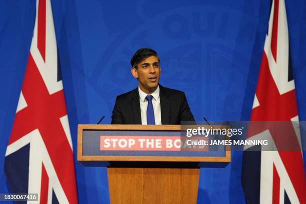 Britain's Prime Minister Rishi Sunak hosts a press conference inside the Downing Street Briefing Room, in central London, on December 7 after Britain...