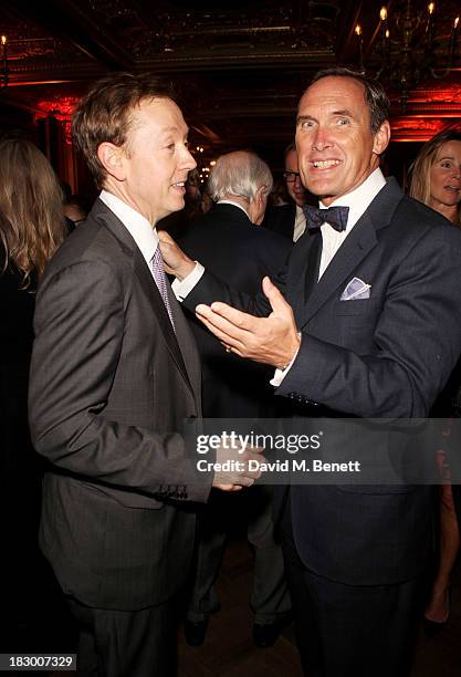 Geordie Greig and A.A. Gill attend the launch of Geordie Greig's new book "Breakfast With Lucian" on October 3, 2013 in London, England.