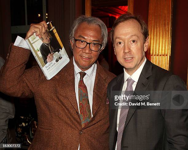 Sir David Tang and Geordie Greig attend the launch of Geordie Greig's new book "Breakfast With Lucian" on October 3, 2013 in London, England.