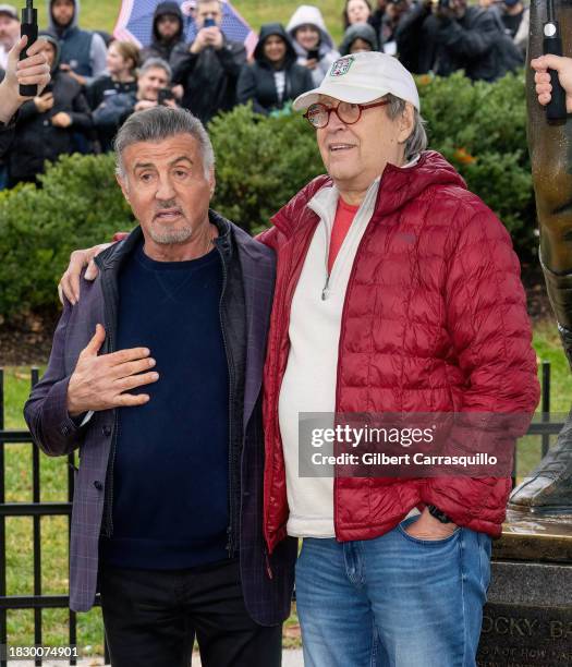 Actor/filmmaker Sylvester Stallone and comedian/actor Chevy Chase attend the grand opening of the 'Rocky Shop' as the City of Philadelphia declares...