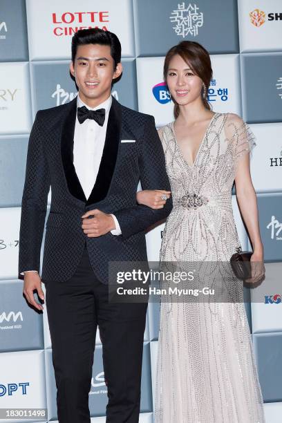 Taecyeon of South Korean boy band 2PM and actress Lee Yeon-Hee attend the opening ceremony during the 18th Busan International Film Festival on...