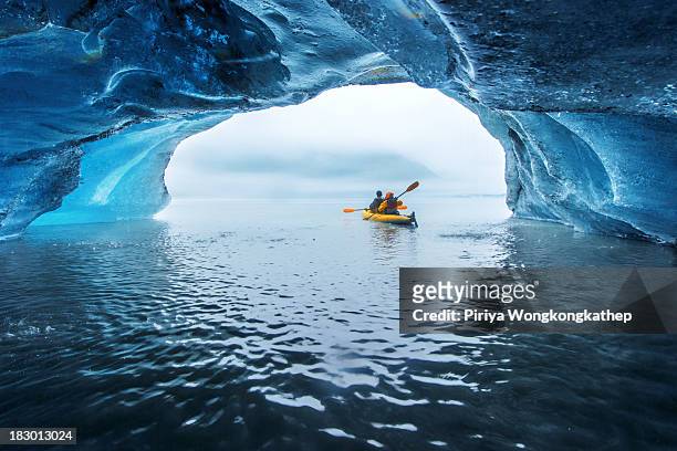 Tourist enjoyed kayaking tour while they got inside a floating iceberg that was from Valdez Glacier in Alaska