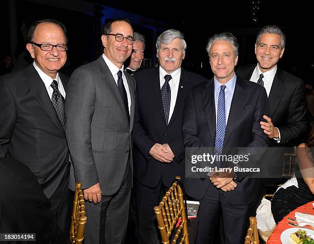 President of the University of Southern California C. L. Max Nikias, actor Jerry Seinfeld, Romeo Dallaire, Jon Stewart and George Clooney attend the...