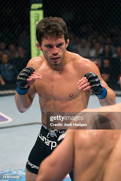 Jake Ellenberger faces Rory MacDonald in their welterweight bout during the UFC on FOX event at Key Arena on July 27, 2013 in Seattle, Washington.