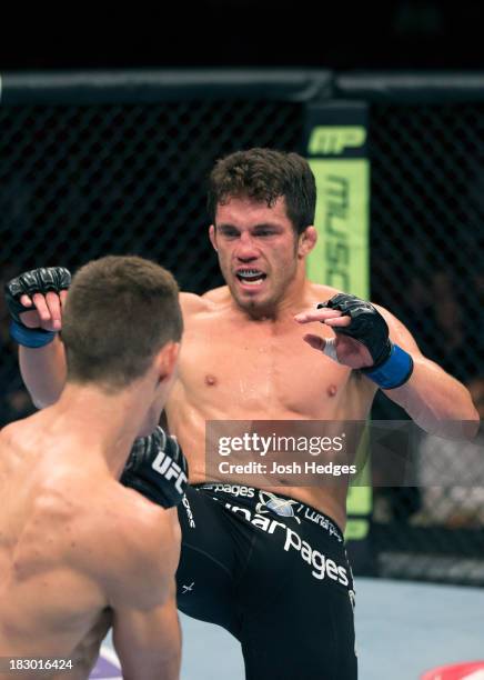 Jake Ellenberger faces Rory MacDonald in their welterweight bout during the UFC on FOX event at Key Arena on July 27, 2013 in Seattle, Washington.