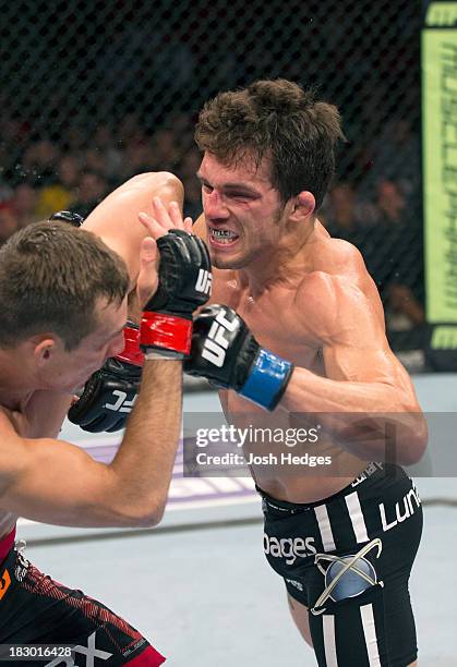 Jake Ellenberger faces Rory MacDonald in their welterweight bout during the UFC on FOX event at Key Arena on July 27, 2013 in Seattle, Washington.