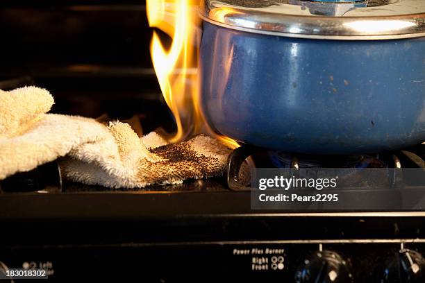 stove fire series - kitchen fire stock pictures, royalty-free photos & images